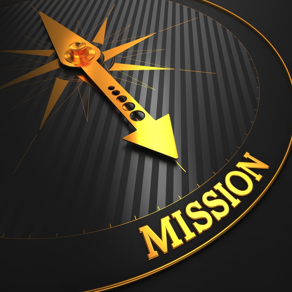 Mission - Business Concept. Golden Compass Needle on a Black Field Pointing to the Word Mission. Mission - Business Concept. Golden Compass Needle on a Black Field Pointing to the Word Mission.